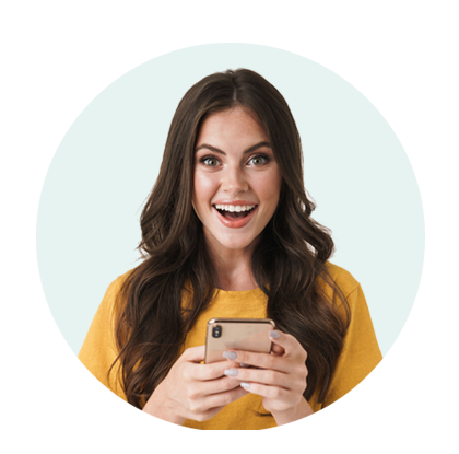 Happy customer on her phone after getting approved
